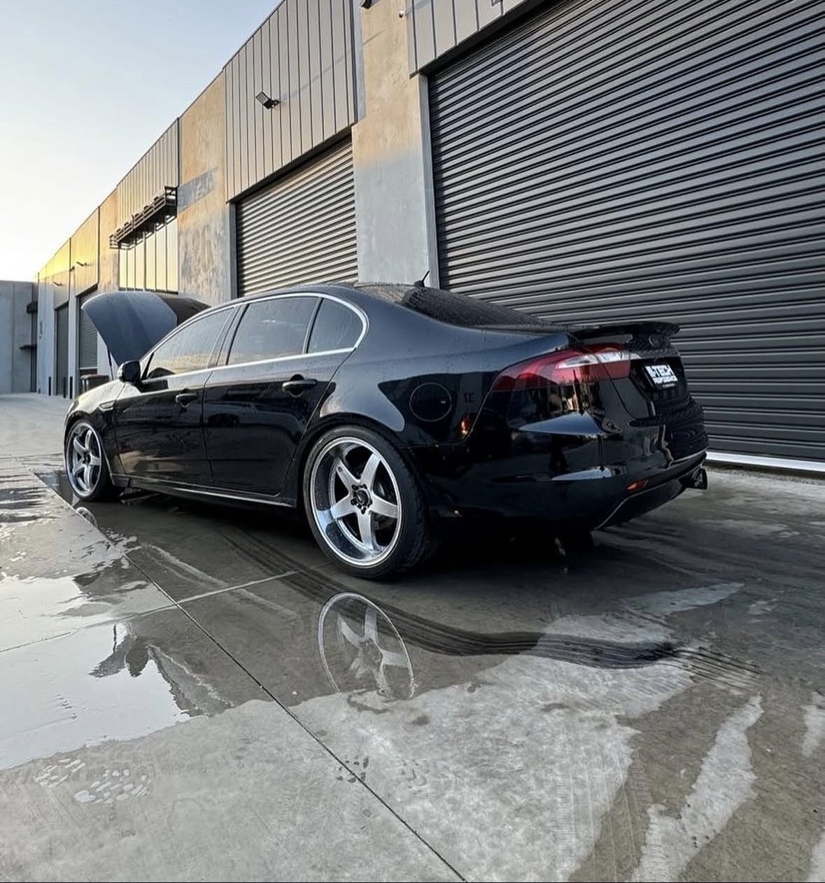 Black Ford FG-X outside the workshop after upgrades
