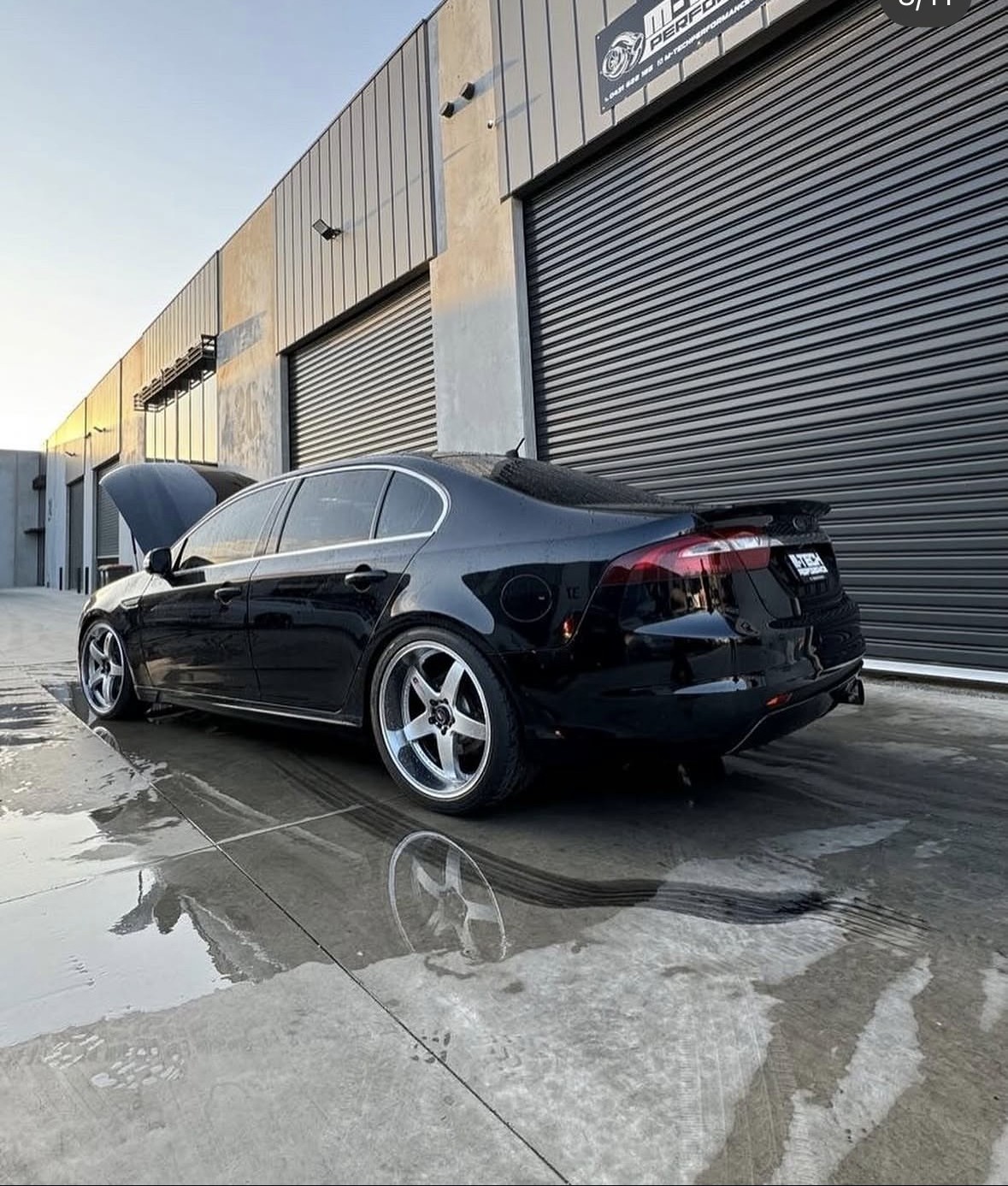 Black Ford FG-X outside the workshop after upgrades