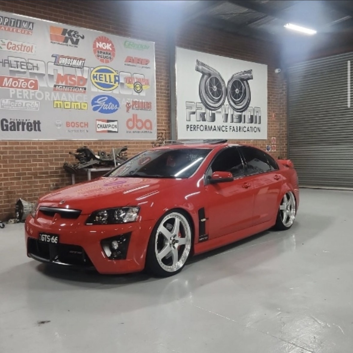 Red modified Holden Commodore inside Pro-Vision